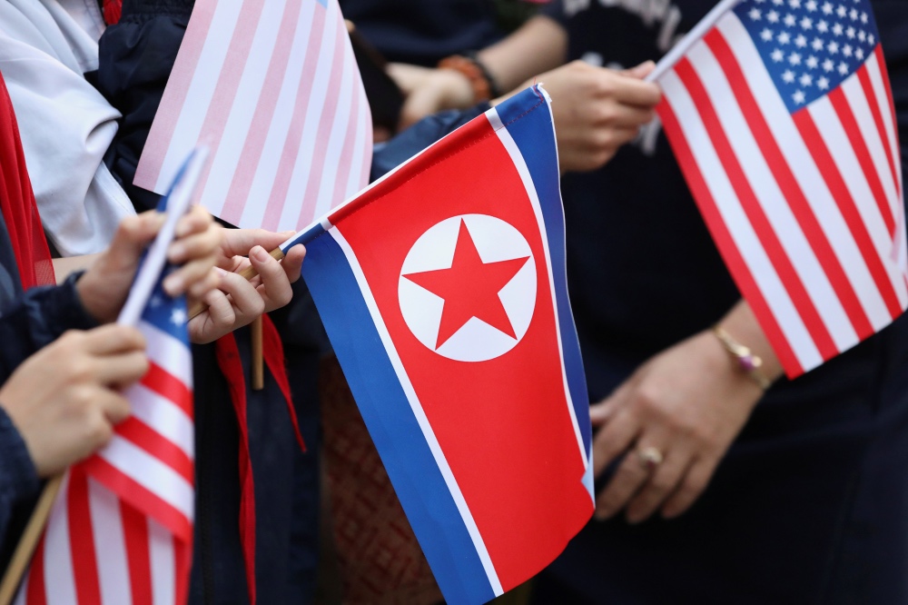 North Korea US flags