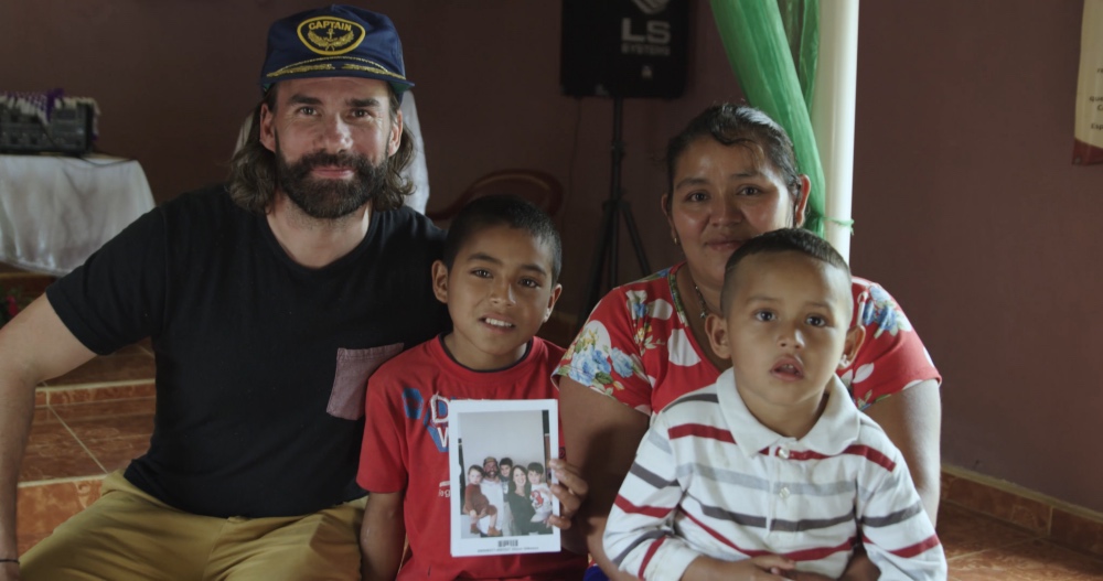 Gareth and his sponsored child and family