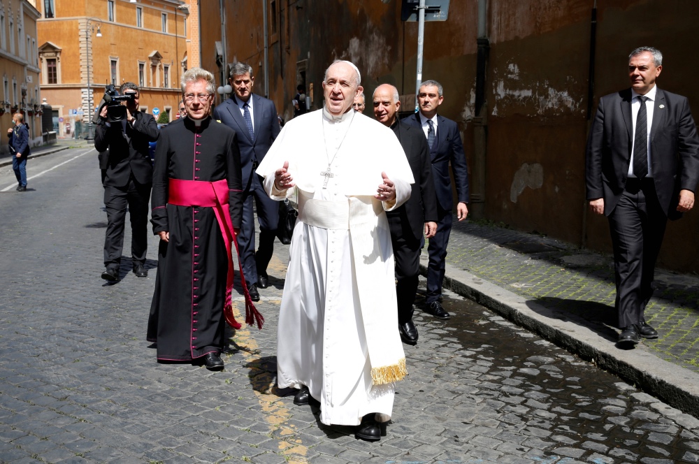 Pope Francis walking streets of Rome