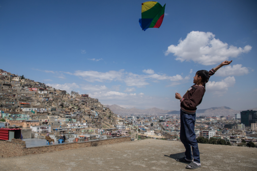 Afghanistan Kabul child flying kite
