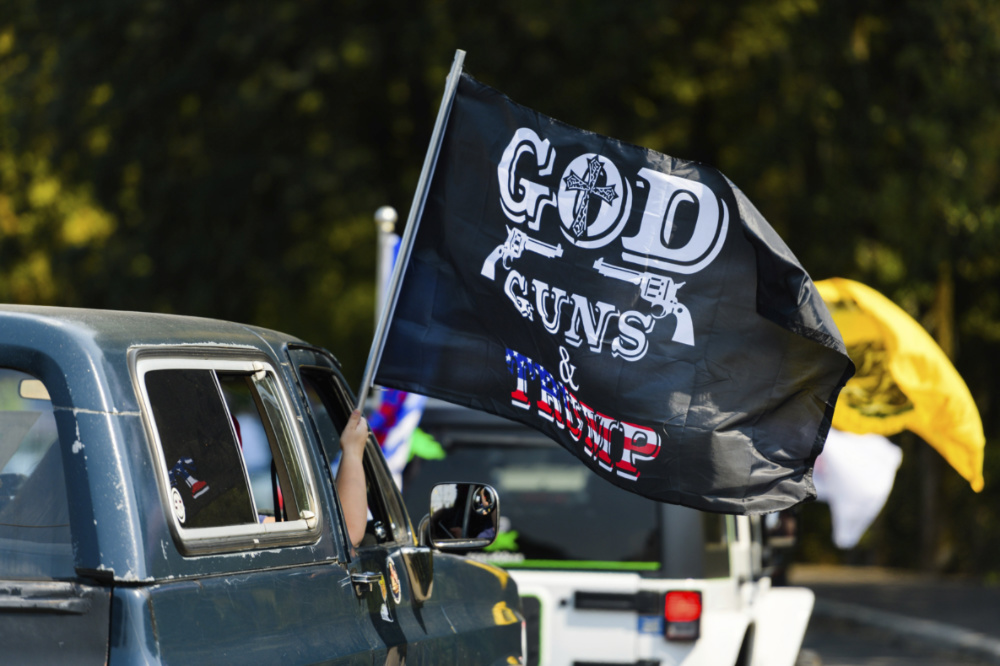 God guns and Trump banner