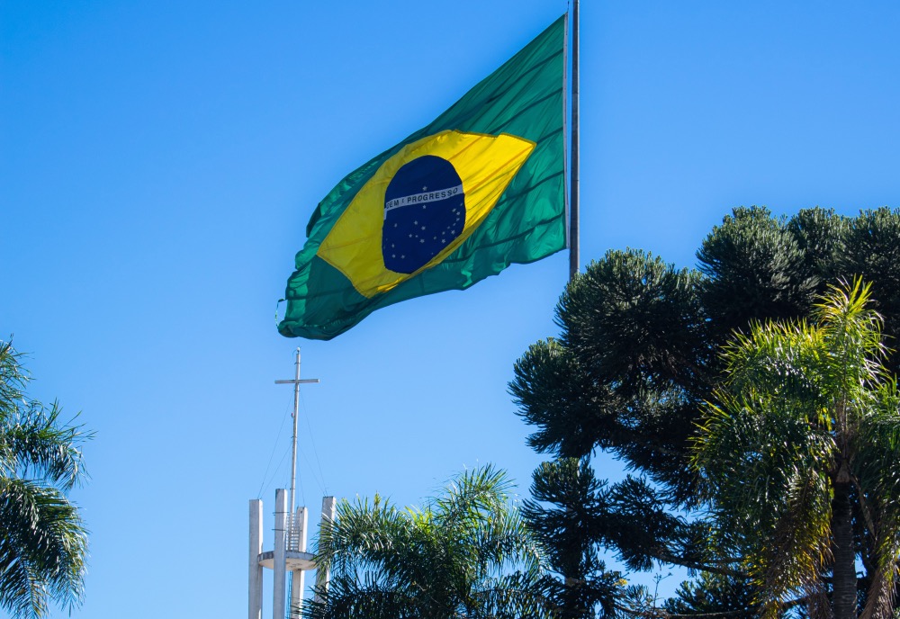 Brazillian flag and a cross