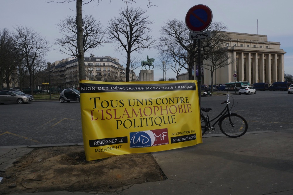France anti radicalisation bill protest banner