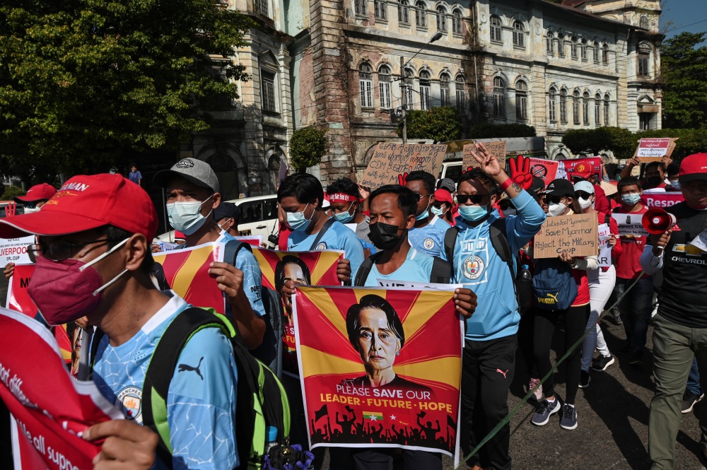 Myanmar military coup protestors marching in Yangon
