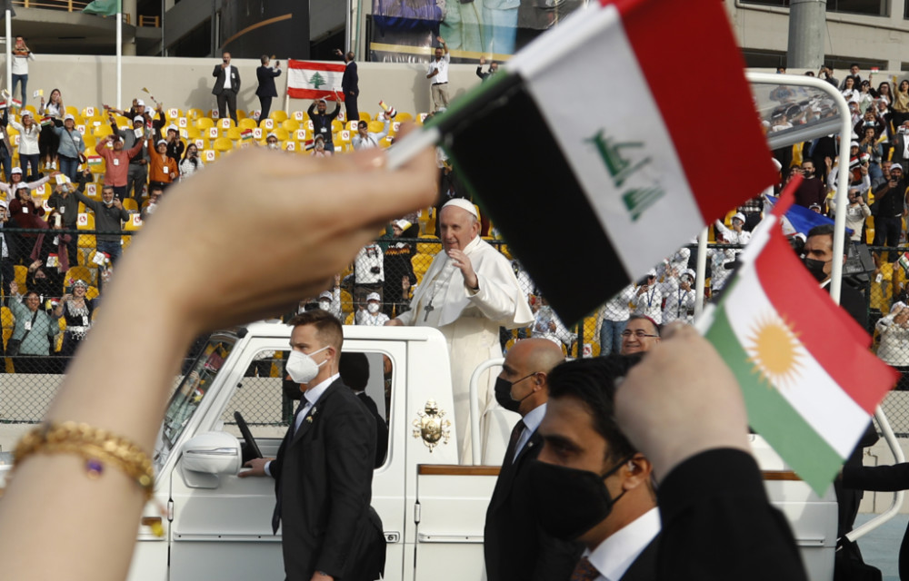 Iraq papal visit Syrian flag
