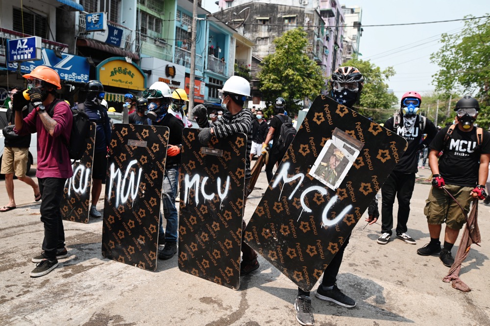 Myanmar Yangon protestors with shields