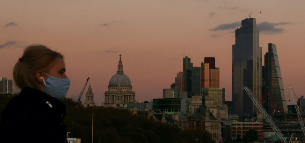 UK woman and London skyline