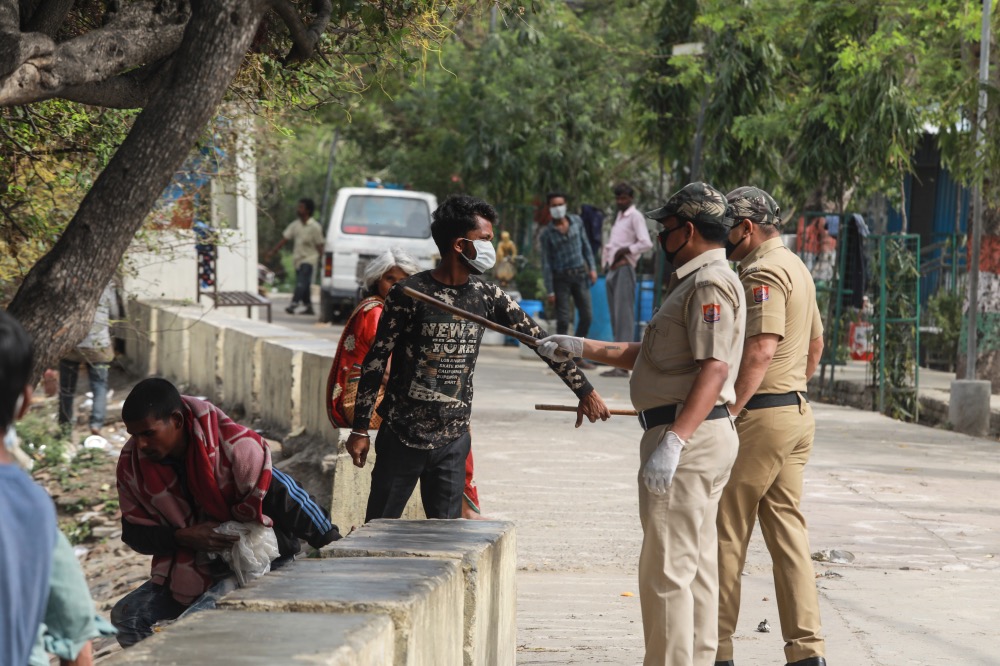India Delhi police and homeless man