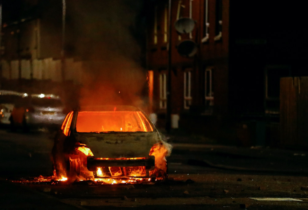 UK Belfast 9 Apr burning car