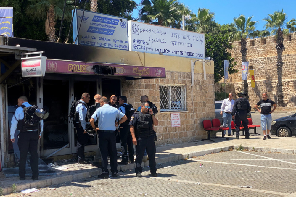 Israel Acre torched police station