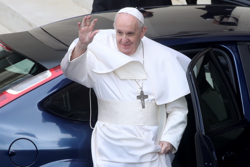Vatican Pope leaving a car