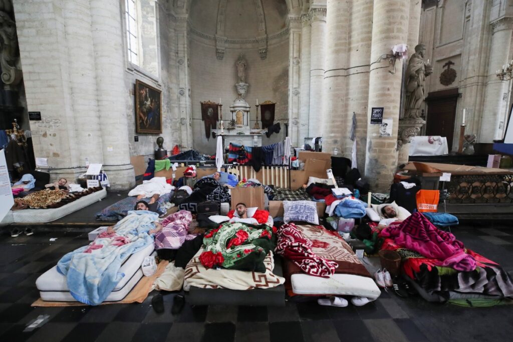 Belgium migrants in Saint Jean Baptiste au Beguinage church