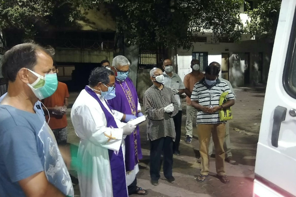 India Ahmedabad priests pray over the body of the late Rev Jerry Sequeira