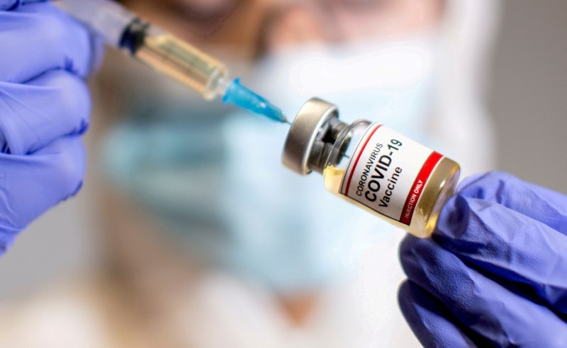 Coronavirus vaccine vial and syringe