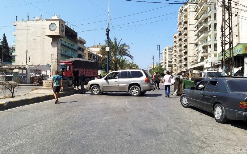 Lebanon Tripoli car blocking road