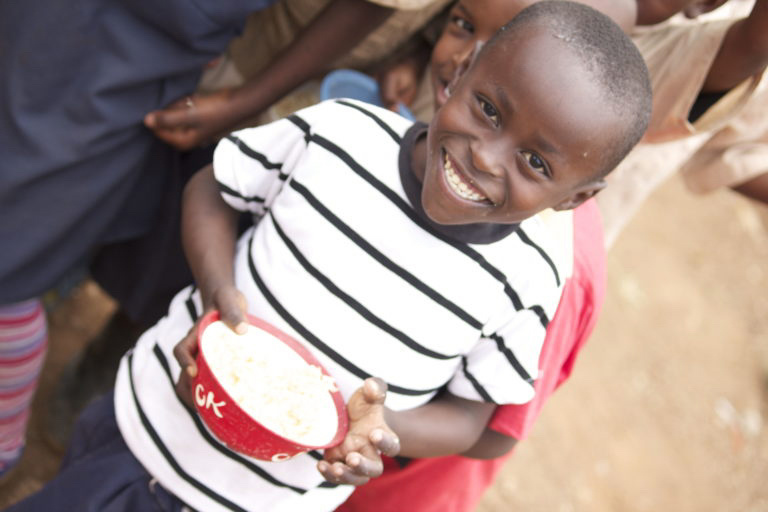 A child receives a meal