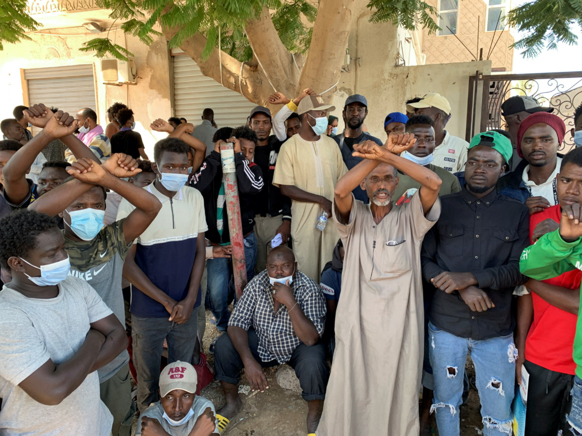 Libya Tripoli migrants outside UNHCR