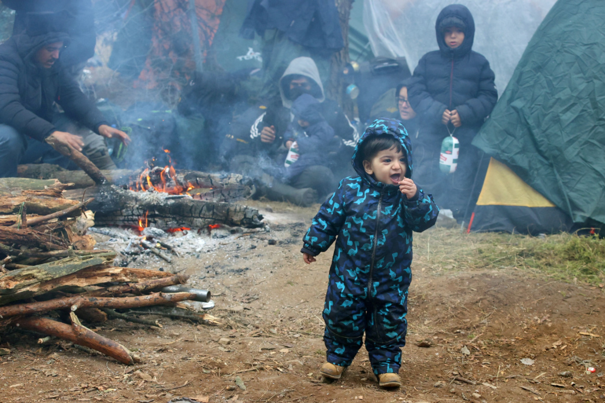 Belarusian Polish border child in migrant camp