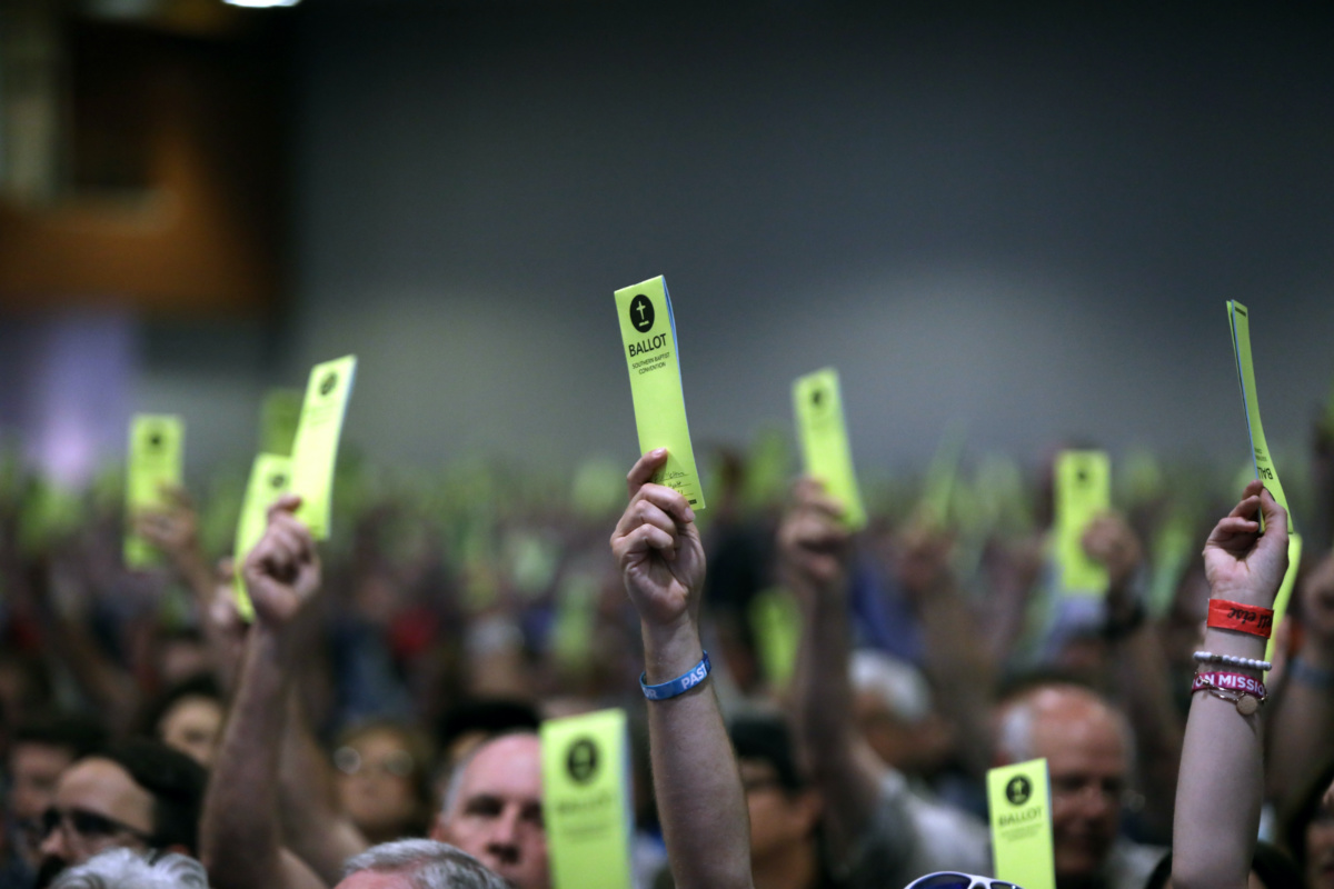 US SBC annual meeting Messengers holding up ballots