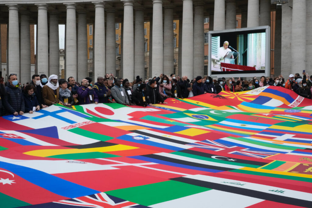 Vatican world flags migrants