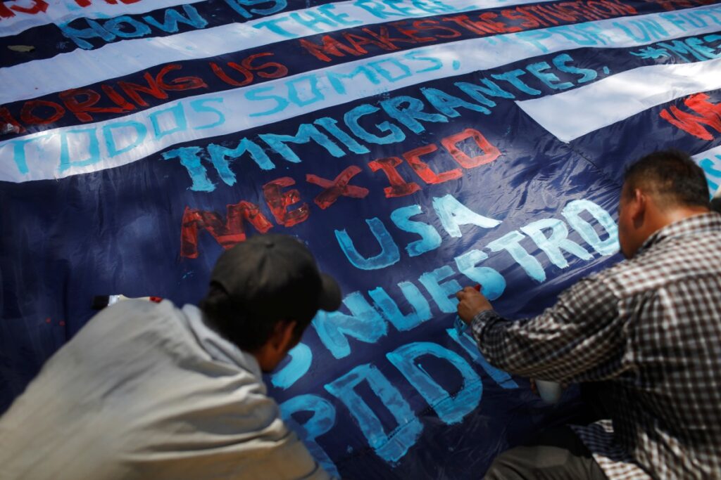 Guatemala migrants banner