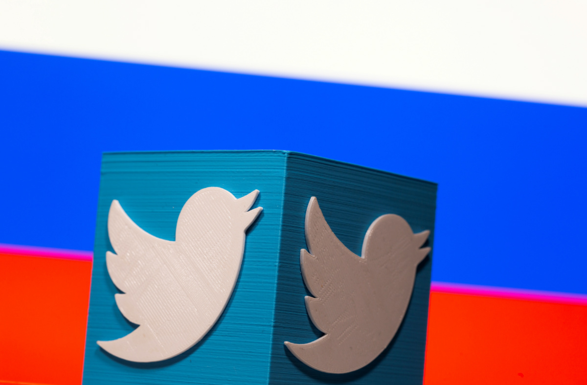 Russian flag and Twitter logo