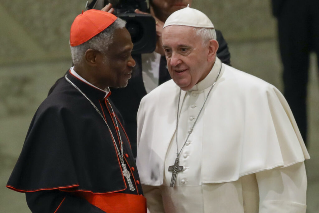 Vatican Cardinal Peter Turkson and Pope Francis