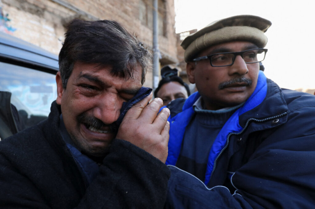 Pakistan mourners after priest killed