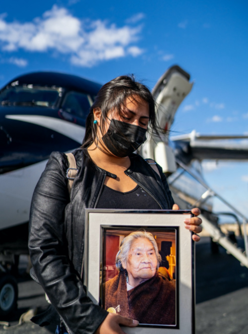 Chile woman holds picture of Cristina Calderon