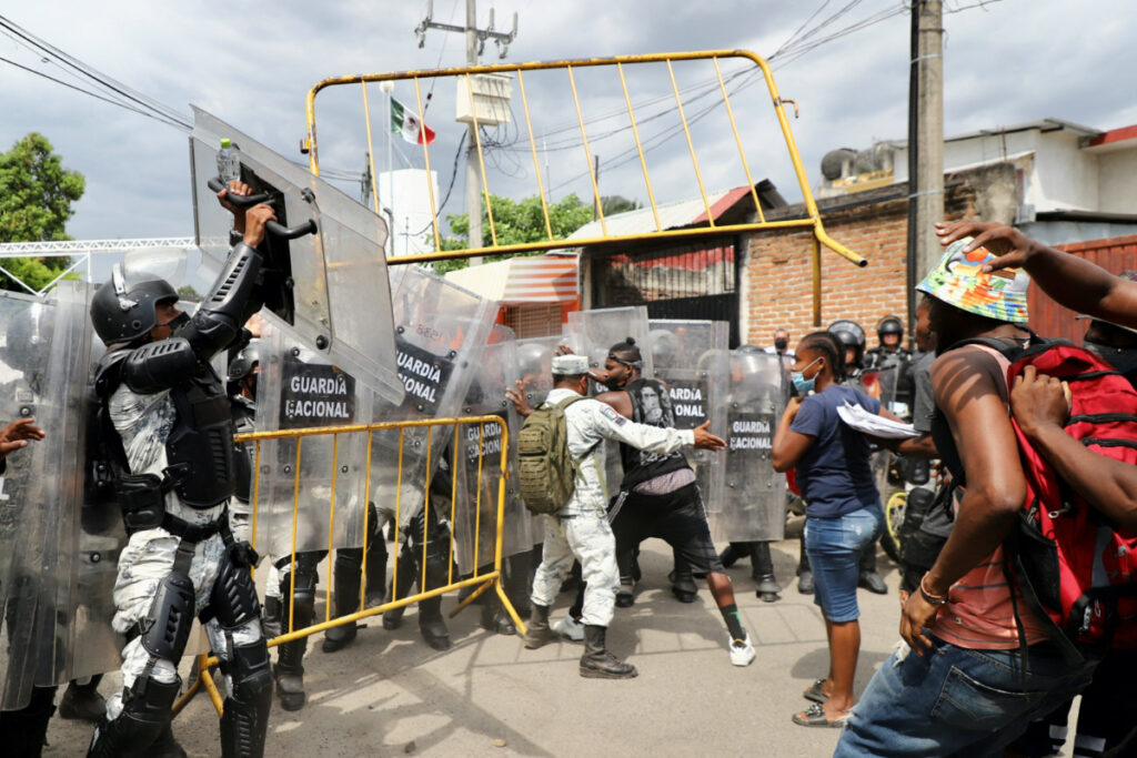 Mexico Tapachula migrants clash with police