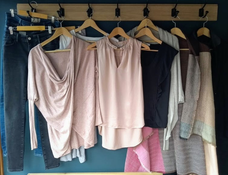 Clothes in a wardrobe