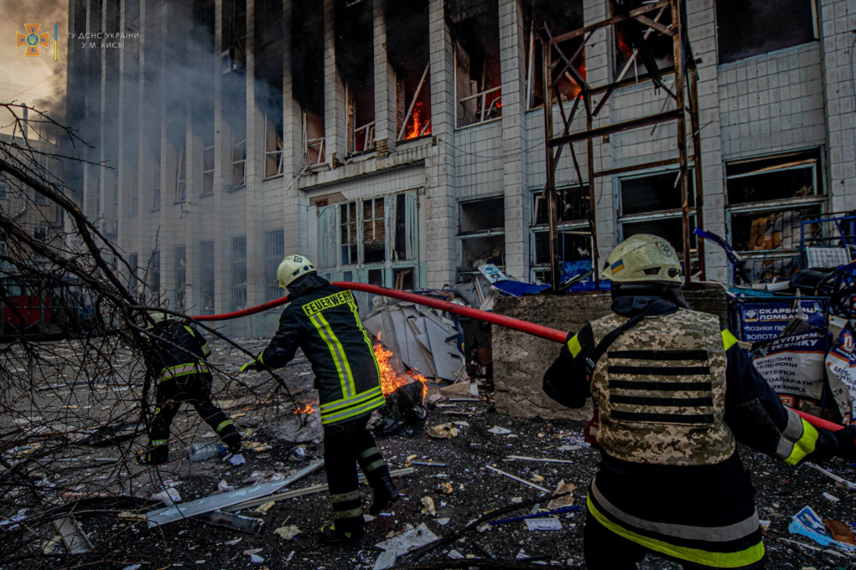 Ukraine Kyiv firefighters after airstrike
