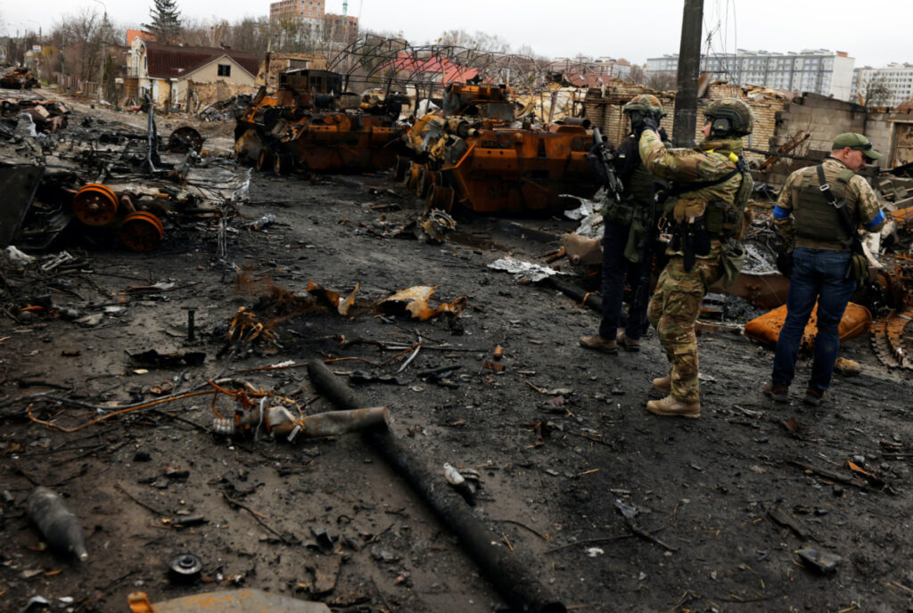 Ukraine Bucha destroyed vehicles