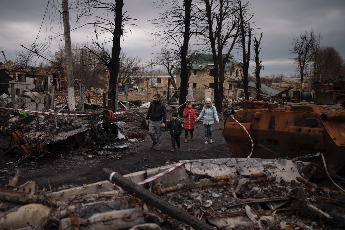 Ukraine Bucha family amid ruins