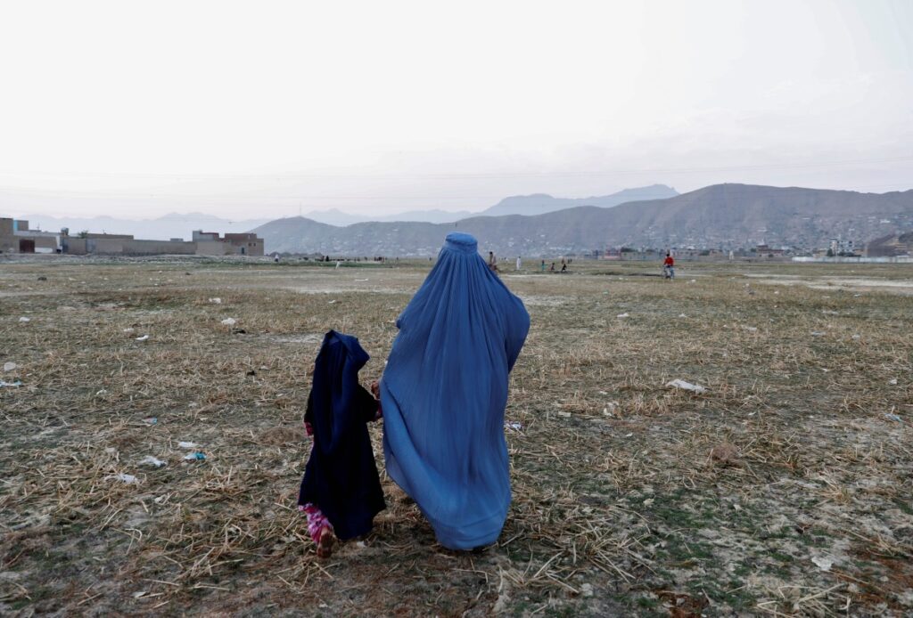 Afghanistan Kabul woman wearing burqa