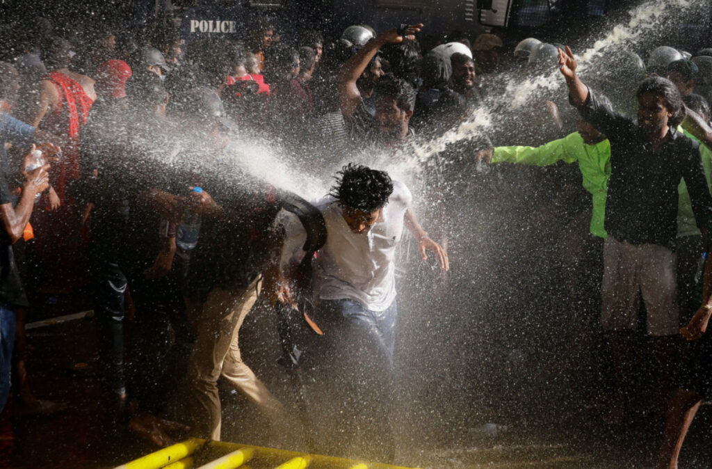 Sri Lanka Colombo protestors and water cannon