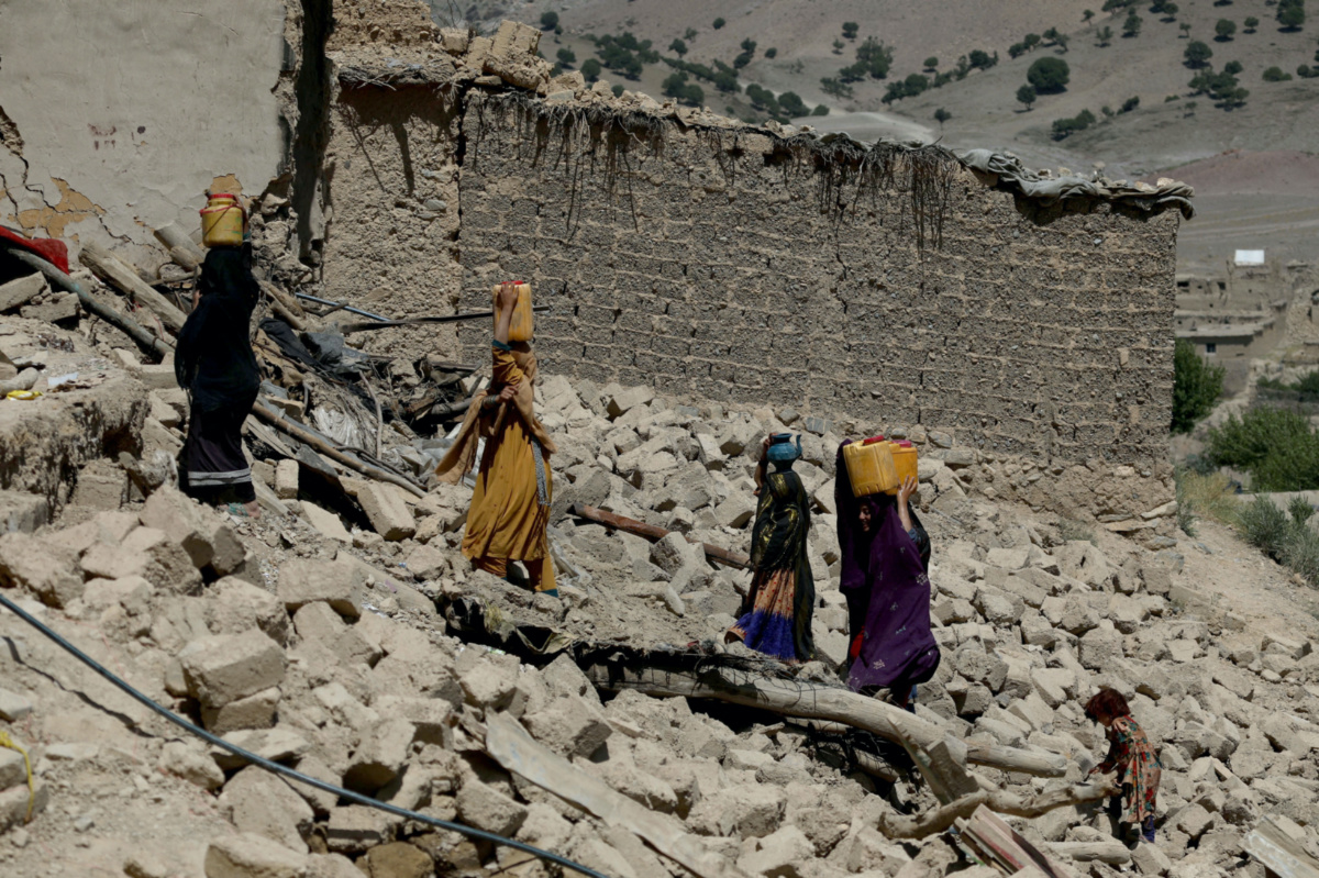 Afghanistan Paktika women and damaged houses