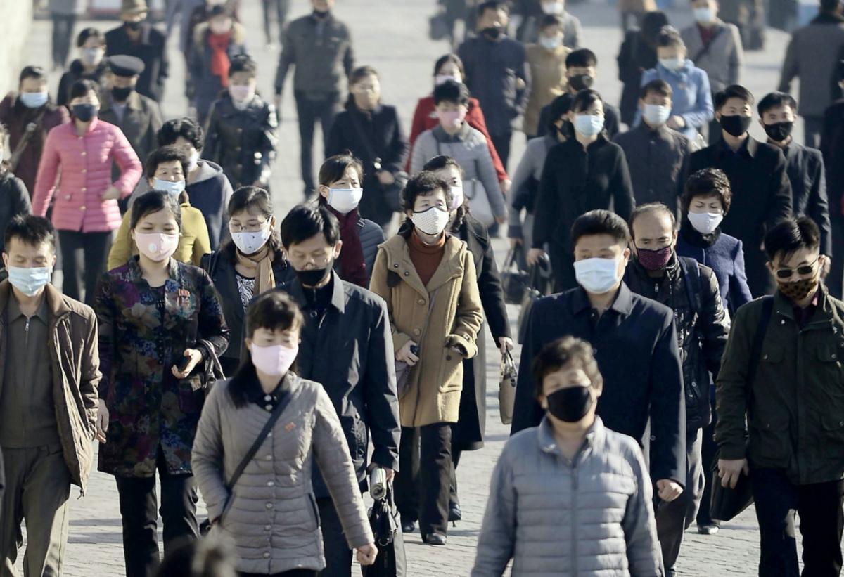 North Korea Pyongyang people wearing masks