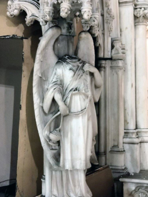 US New York St Augustine Catholic Church vandalised statue