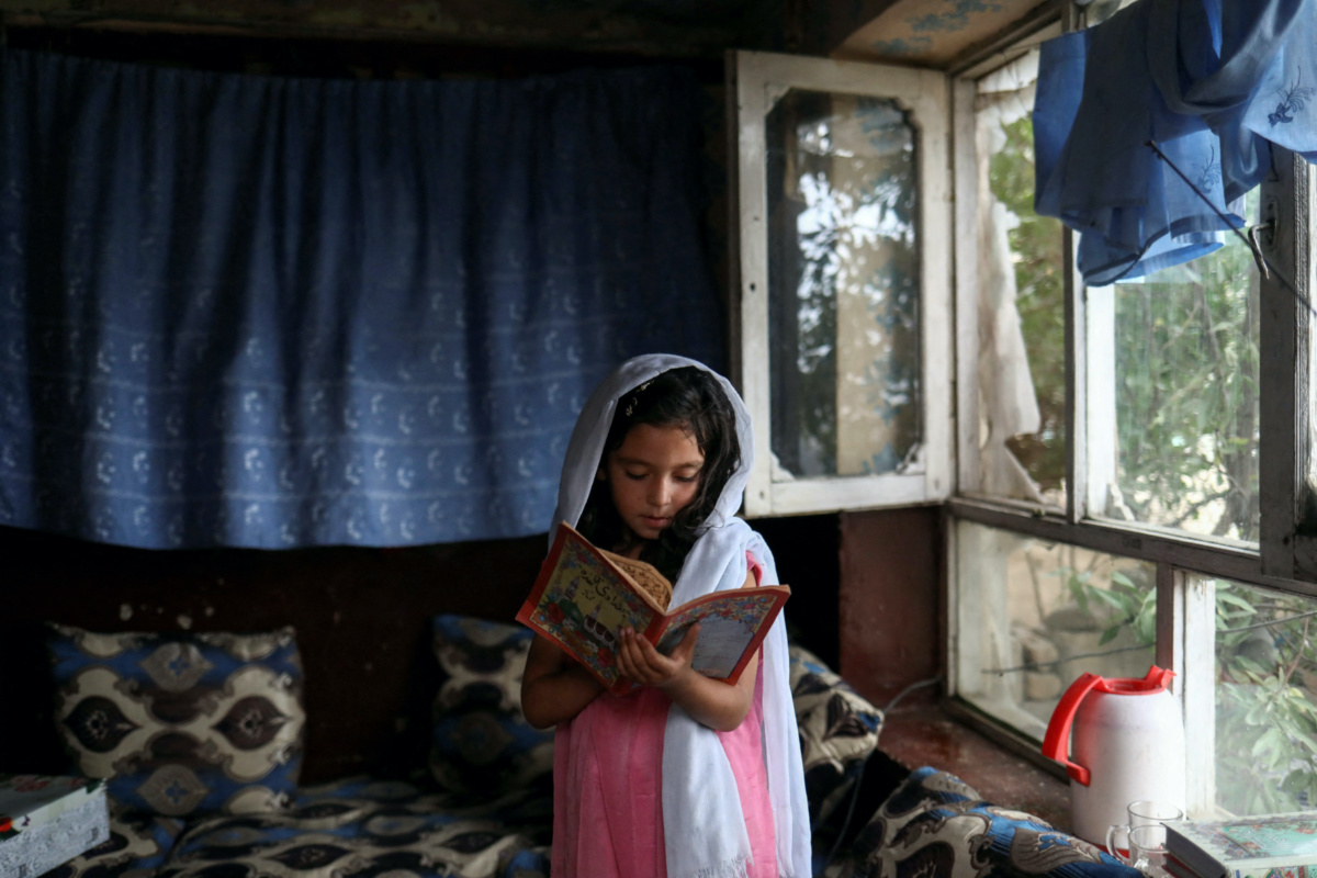 Afghanistan Kabul girl reading book