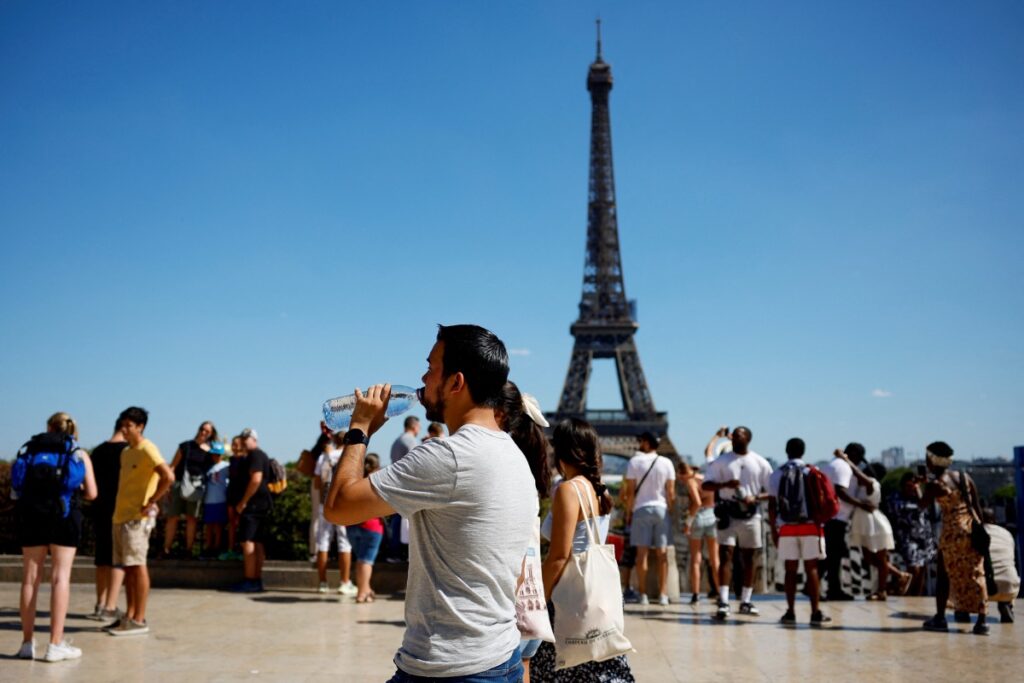France Paris Eiffel Tower heatwave