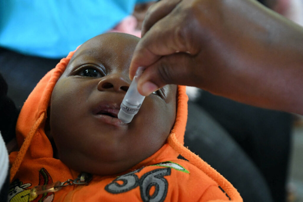 Uganda Fort Portal Regional Referral Hospital child receiving vaccine