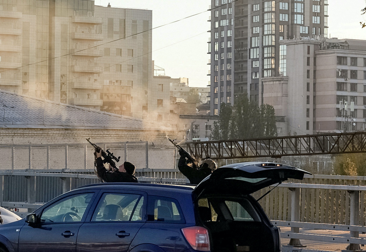 Ukraine Kyiv police trying to shoot down a drone