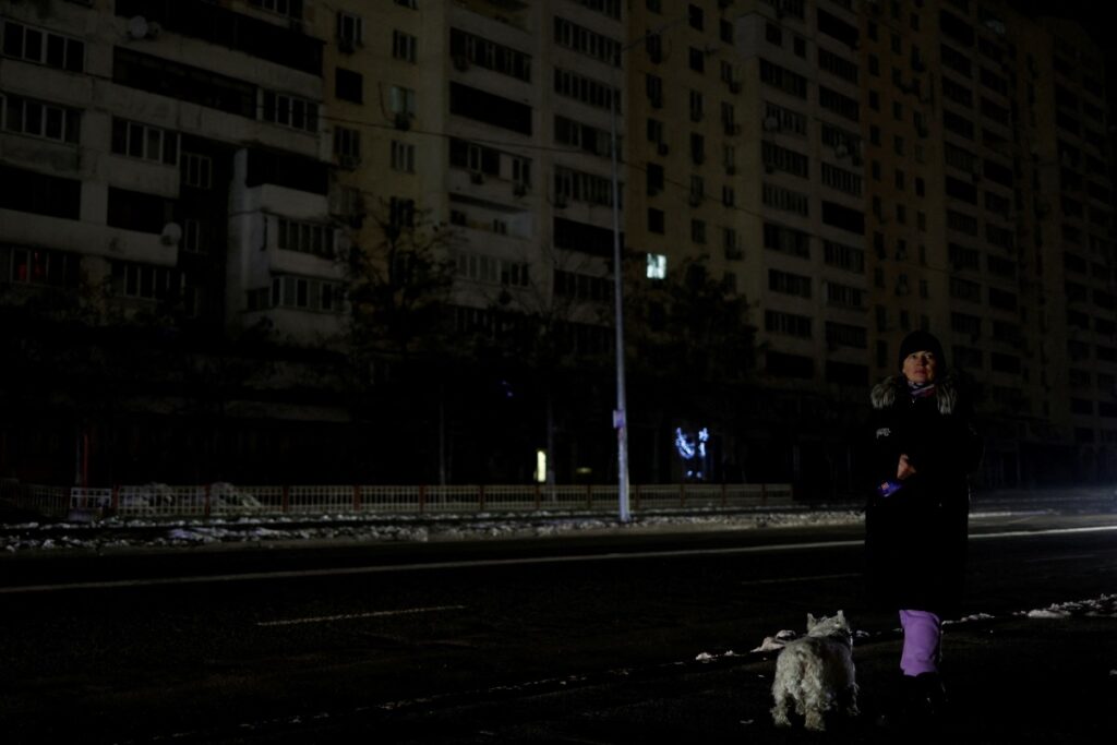 Ukraine Kyiv woman and dog