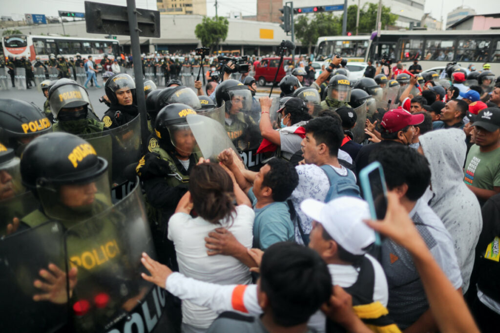 Peru Lima police and protestors clash