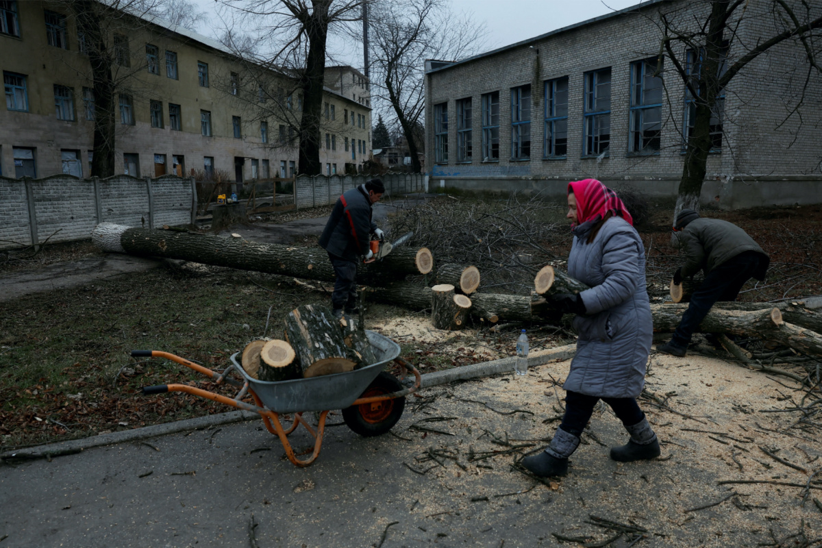 Ukraine Bakhmut collecting firewood