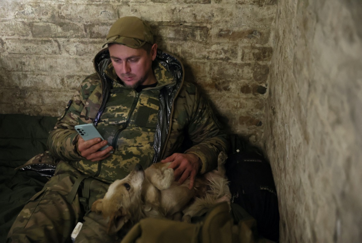 Ukraine Bakhmut soldier and dog