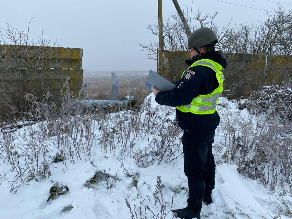 Ukraine Kyiv police officer near cruise missile remains