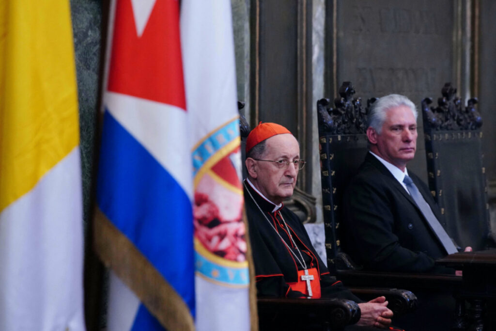 Cardinal Beniamino Stella and Cuba's President Miguel Diaz-Canel take part in an event at the University of Havana to celebrate the 25th anniversary of Pope St John Paul II's visit to Cuba, in Havana, Cuba, February 8, 2023.