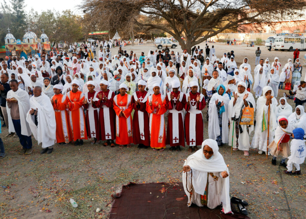 FILE PHOTO: Ethiopian Orthodox faithful attend Epiphany celebration to commemorate the baptism of Jesus Christ on Lake Dambal in Batu town of Oromia Region, Ethiopia January 19, 2023. REUTERS/Tiksa Negeri/File Photo